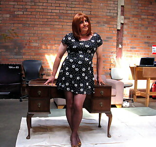 Miss Melissa Monroe, A Mature TV, coyly poses.