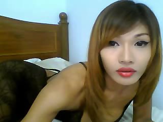 Asian tranny smokes by webcam