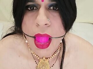 gagged Indian princess swallows own cum