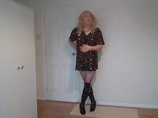 Black boots, short dress and pantyhose