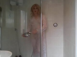 White lace dress soaked in the hot shower