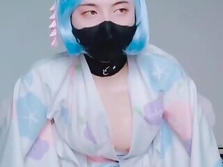 Asian Femboy rides cock in chastity