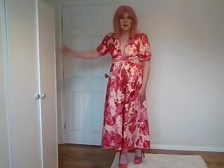 Pink stockings under a long red dress