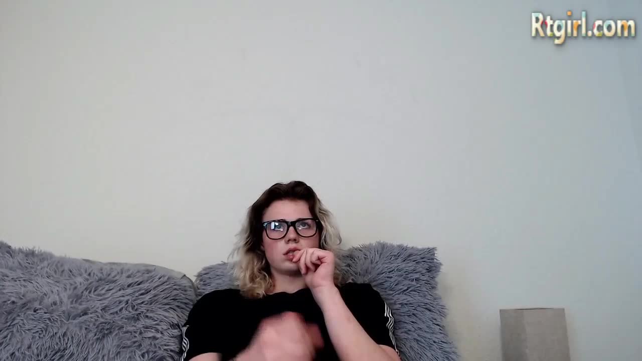 petite shemale cutie in  glasses stroking her big cock until she cum shottting